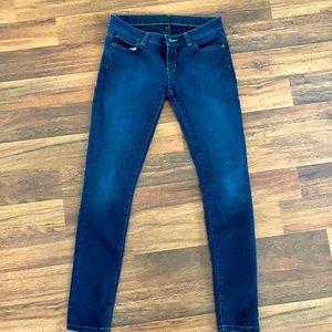 Michal Kors skinny dark wash jeans.